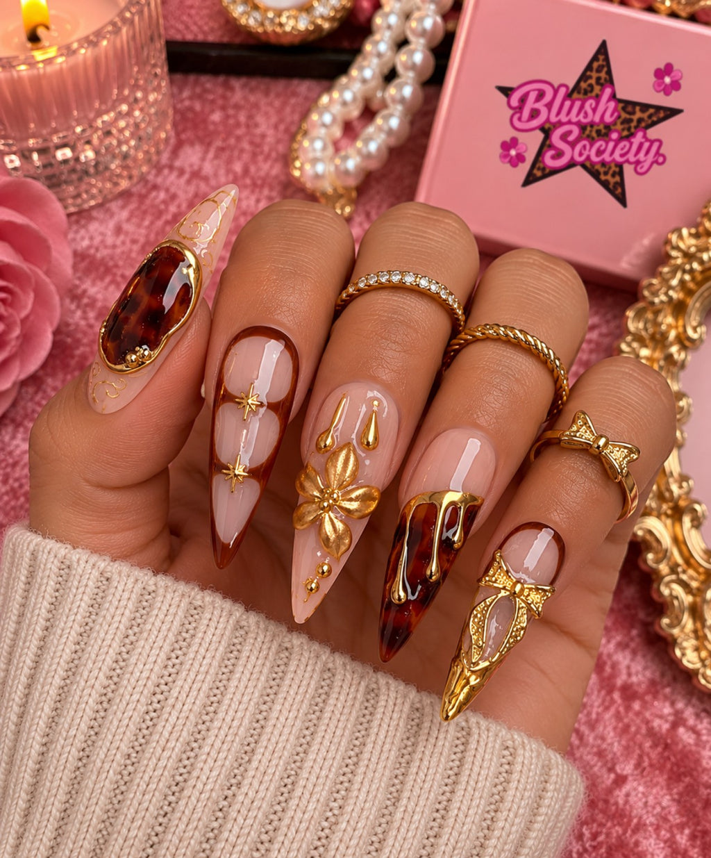 Amber Bow Luxe long press-on nails modeled on hand by Blush Society