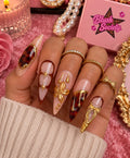 Amber Bow Luxe long press-on nails modeled on hand by Blush Society