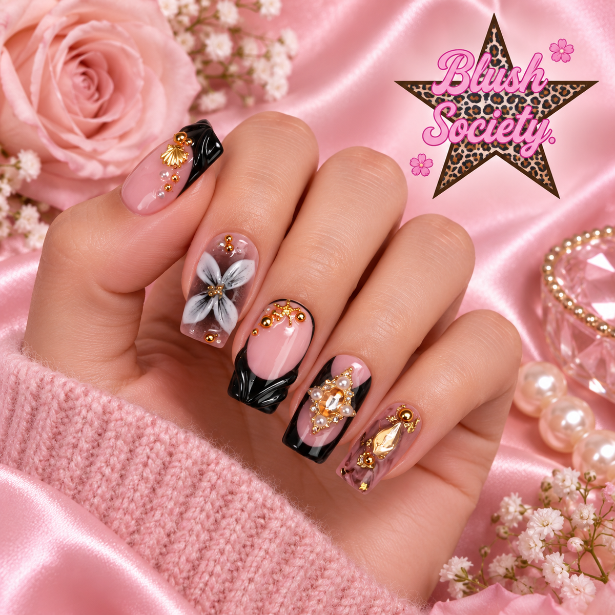 Midnight Bloom press-on nails modeled on hand