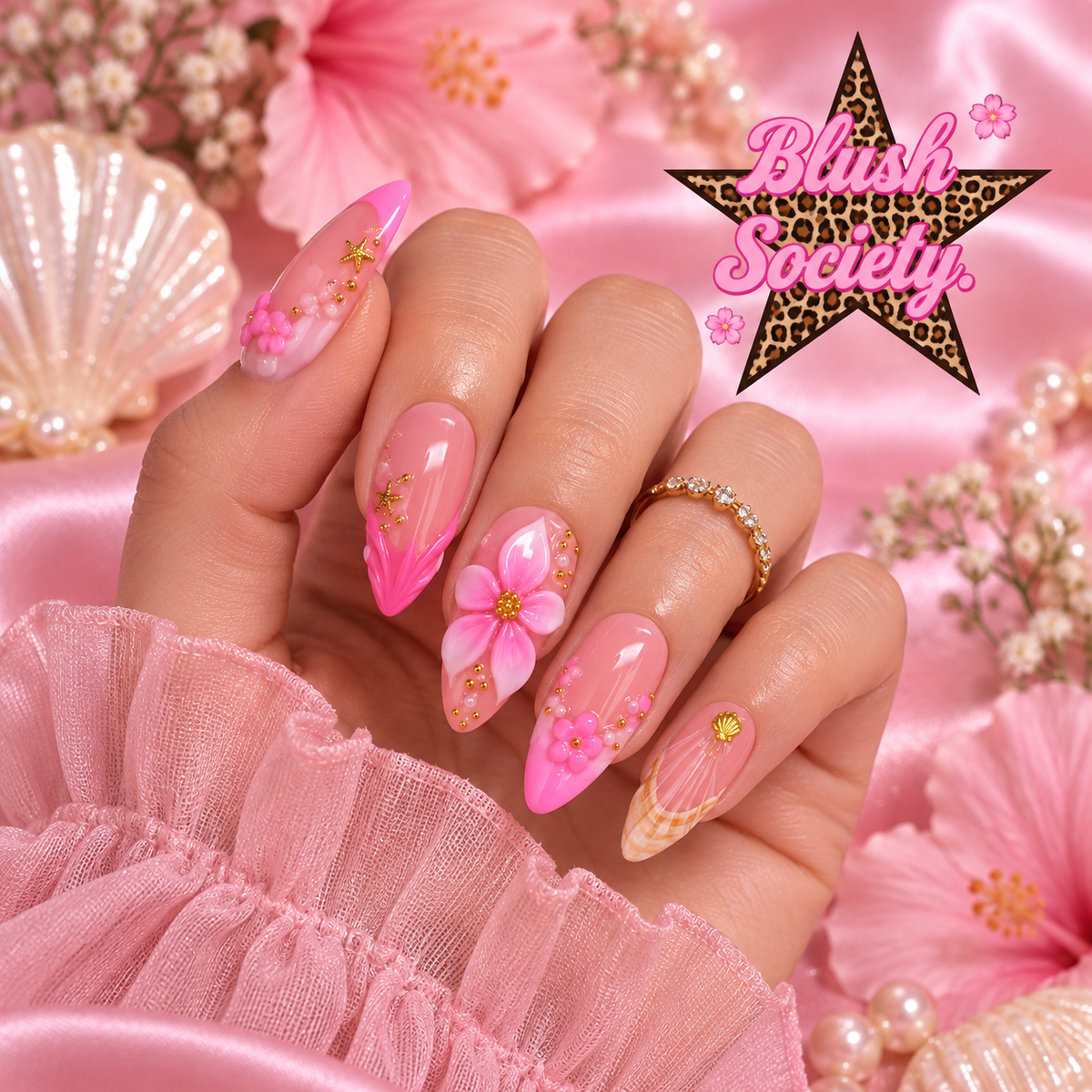 Pink Paradise press-on nails modeled on hand